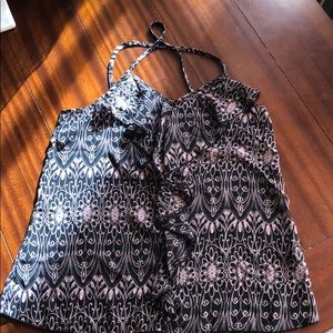 Blush and Black blouse crosses on the back